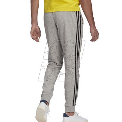 3. Adidas Essentials Tapered Cuff 3 Stripes M GK8889 pants