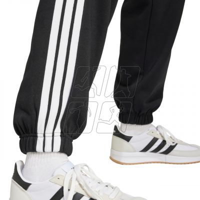 5. adidas Essentials 3-Stripes Fleece Loose-Fit Pants W JE1276