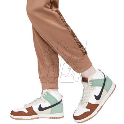 10. Nike Nsw PK Tape Reg W DM4645 256 pants