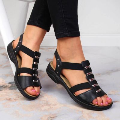 3. Black leather Roman sandals Rieker W 64580