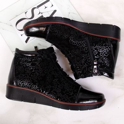 14. Women’s black insulated leather ankle boots with print, Filippo