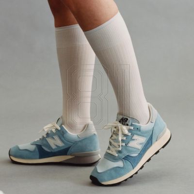 10. New Balance M475VTG Shoes