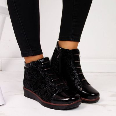 11. Women’s black insulated leather ankle boots with print, Filippo