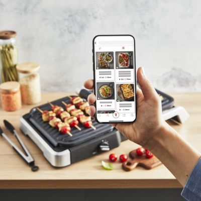 12. Tefal OptiGrill 4-in-1 GC774D10 Electric Grill