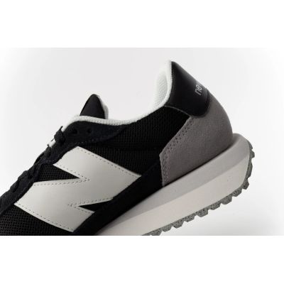 7. New Balance 237 Men’s Black Leather Sneakers