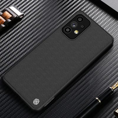 13. Nillkin Textured Case durable reinforced case with gel frame and nylon back for Samsung Galaxy A73 black